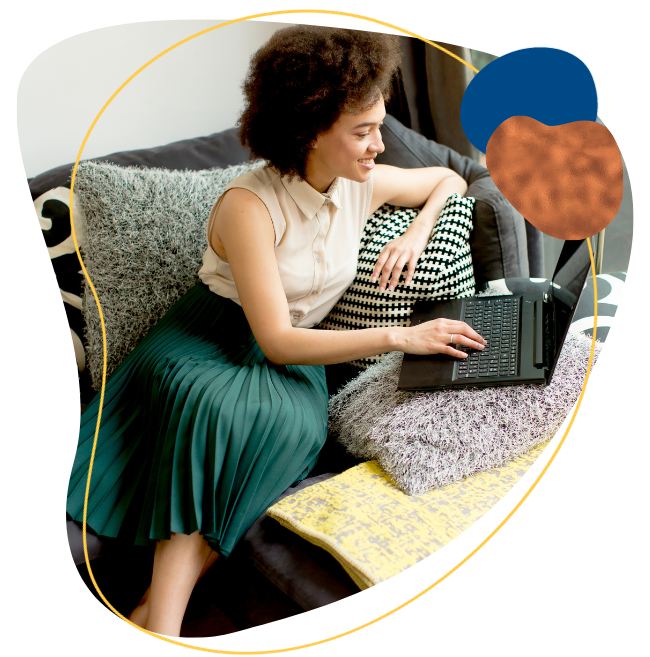 Woman on a couch with her laptop (1)